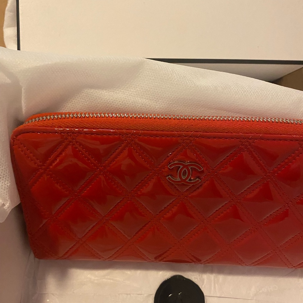CHANEL Quilted Patent Leather Zip Wallet in Vibrant Orange-Red